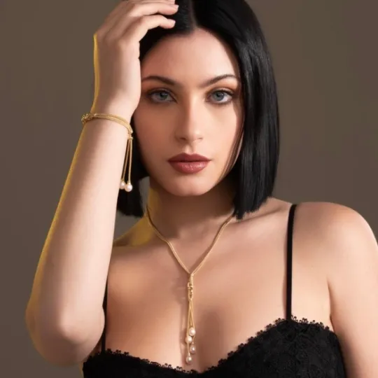 Collana in argento a doppia staffa e perle pendenti