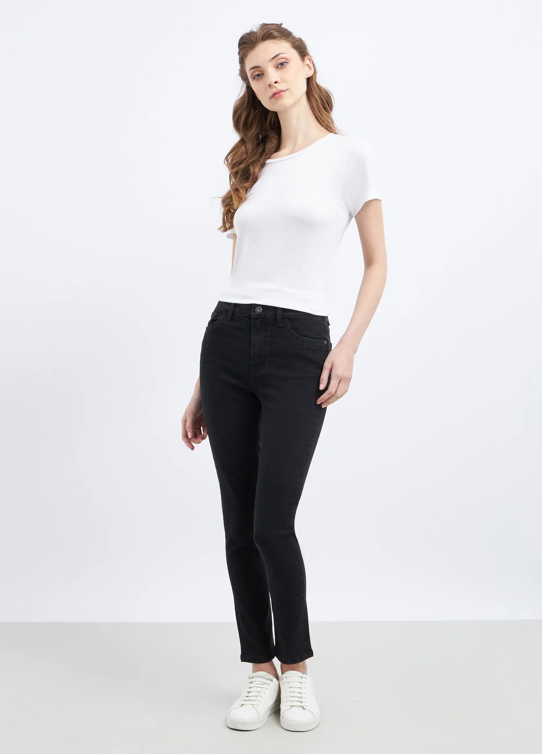 Pantaloni skinny in denim di misto cotone stretch donna