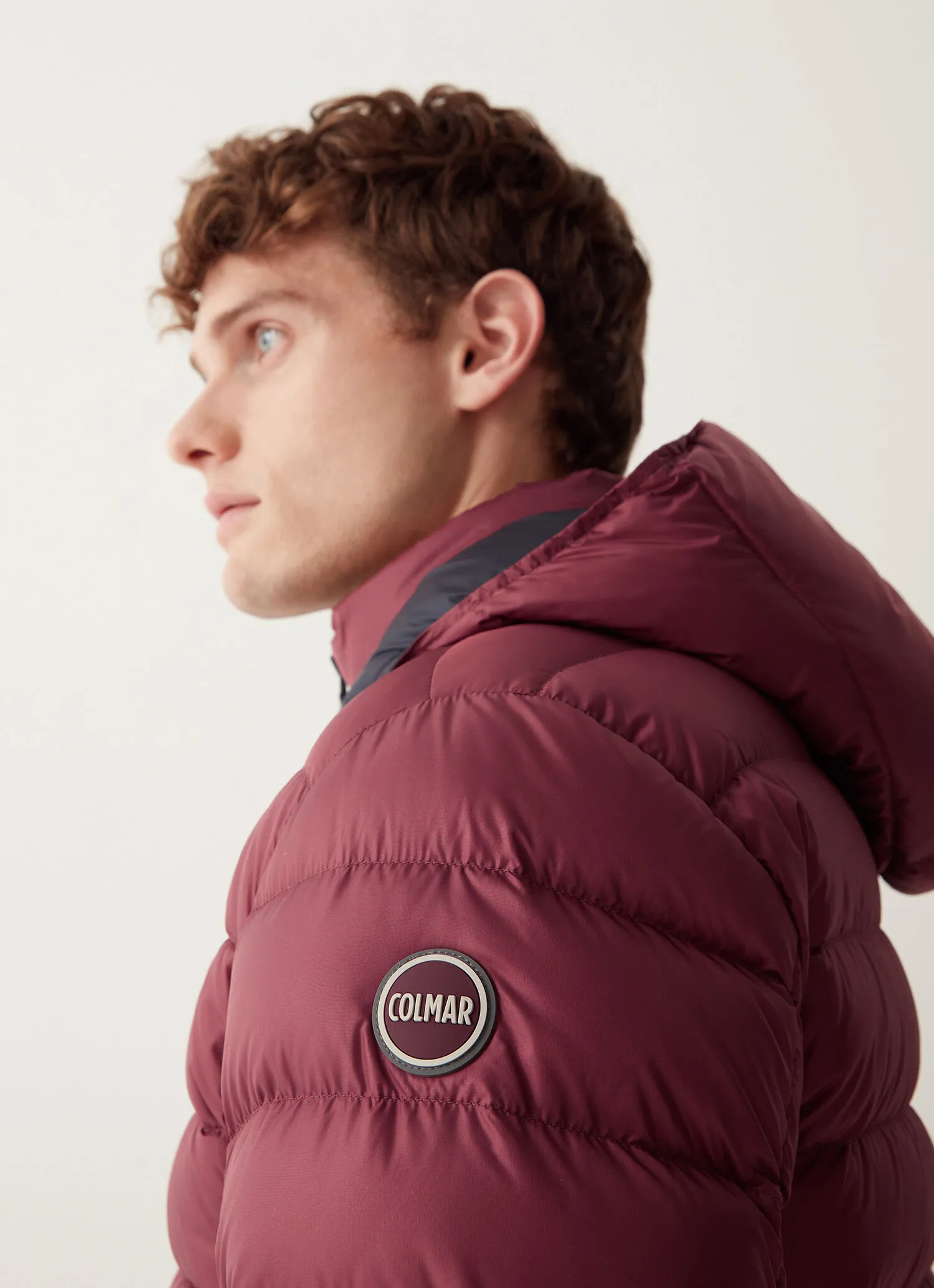 Sporty down jacket with detachable hood